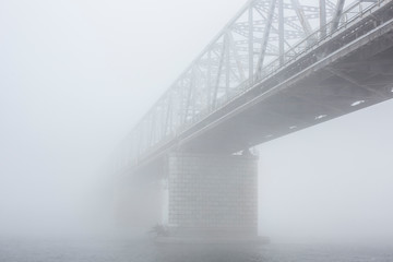 Bridge with fog in the morning