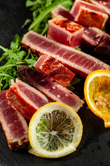 rosted tuna on black slate
