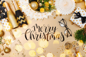 Christmas decoration background in golden and black colors. Flat lay, top view