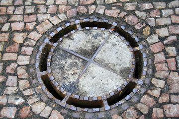 Germany, Drezden, metal sewer cover