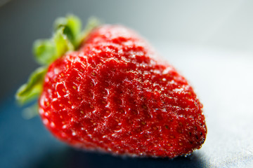 Fresh red strawberry isolated on a black background