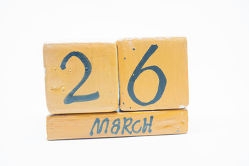 march 26th. Day 26 of month, handmade wood calendar isolated on white background. Spring month, day of the year concept.