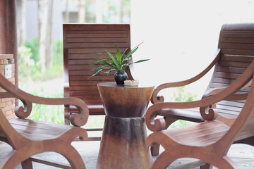 Stylish set of furniture for the rest of mahogany on the terrace of the house. - obrazy, fototapety, plakaty