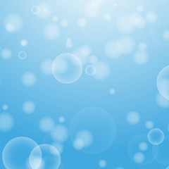 Light blue abstract background with a bokeh in the form of circles. Underwater world with air bubbles. Vector illustration.