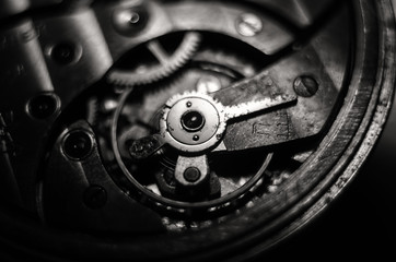 The mechanism of old antique pocket watches, Close up view of old clock's gears. selective focus