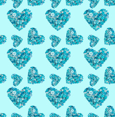 Seamless pattern of turquoise heart made of buttons on a blue background.