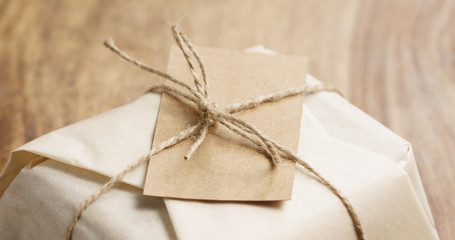 Closeup   of chocolate wrapped with paper as a gift