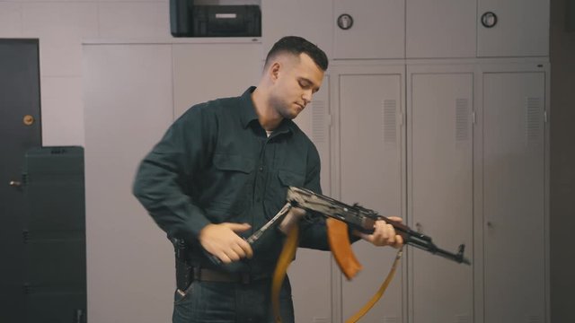 Man training skills with Kalashnikov 