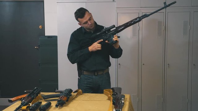 Man training skills with Kalashnikov 
