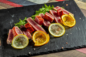 rosted tuna on black slate