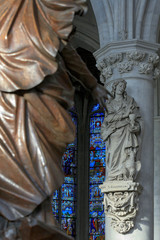 Fototapeta na wymiar oak pulpit in the St. Rumbold's Cathedral