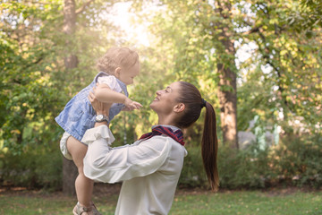 Laughing mother and daughter.