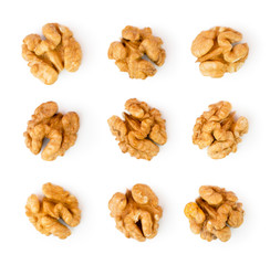 Shelled walnuts on a white. The view from the top.