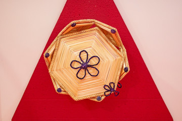 Ornamental hexagonal handmade basket.