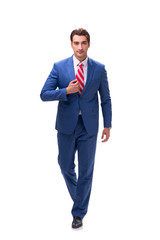 Handsome young businessman isolated on white background