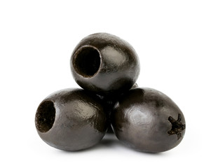 Black olives close up on a white background.