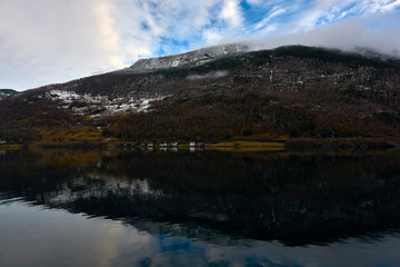 Nærøy fjord in Norway. Landscape of mountains and transparent waters. Spectacular reflections. Dream voyages