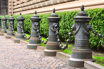 Fence with lions and chains near main building of the Saeima - parliament of the Republic of Latvia...