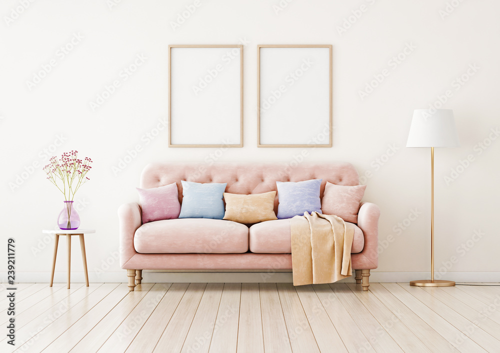 Poster Poster mockup with two vertical frames on empty wall in living room interior with pink sofa and multi-colored pastel pillows. 3D rendering.