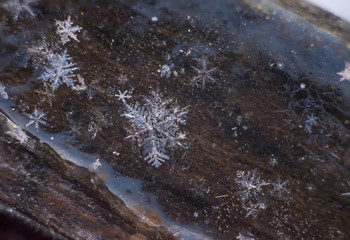 Macro of Snowflakes, frozen in the ice, natural shot