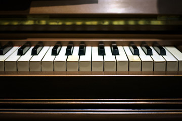 Fototapeta na wymiar close the keys of a musical piano. romantic atmosphere. selective focus. for design and decor. concept of love backround texture.