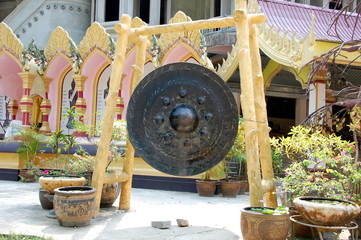 Huge prayer gong in a Buddhist temple, Thailand
