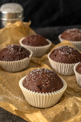 Sweet chocolate muffins with pieces of chocolate.