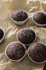 Sweet chocolate muffins with pieces of chocolate.