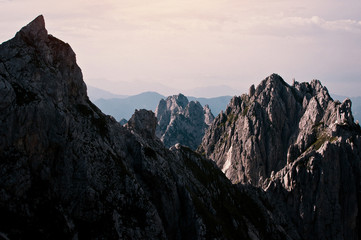 Mountain landscape with Mangart mountain in Julian Alps on the border between Italy and Slovenia