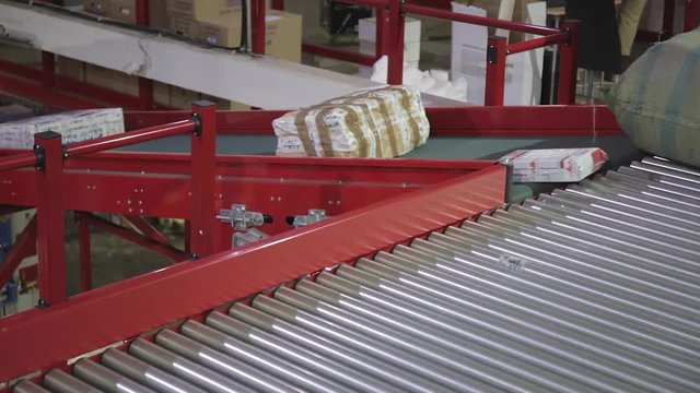Conveyor Belt in Distribution Warehouse Shipping Delivery