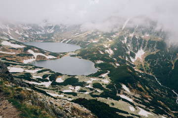 The fog over the mountain Valley of Five Lakes Tatra National Park, Poland Dolina Pieciu Stawow Polskich © v_supertramp