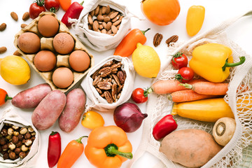 Healthy food on white background top view. Zero waste concept, no plastic. Fresh different vegetarian products, healthy food variety. Banner social media image