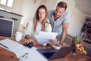 Married couple plans their budget