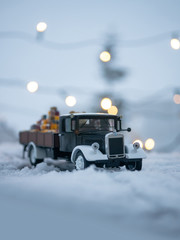 Christmas truck with loaded gifts and bear. Christmas teddy bear and gifts loaded on a car.