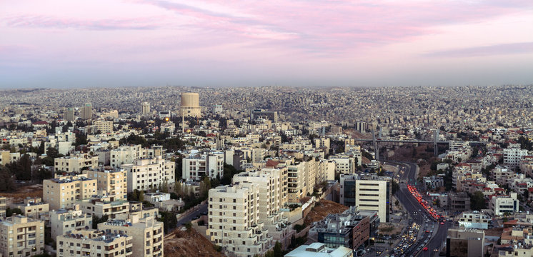 Wide shot for Amman mountains at evening after the sunset