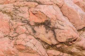 texture of the natural stone background outdoors, pattern