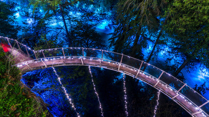 Capilano bridge with Christmas lights seen at night. Beautiful British Columbia, Canada.