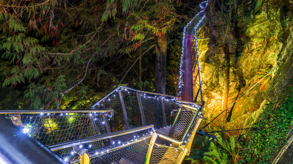 Capilano bridge with Christmas lights seen at night. Beautiful British Columbia, Canada.