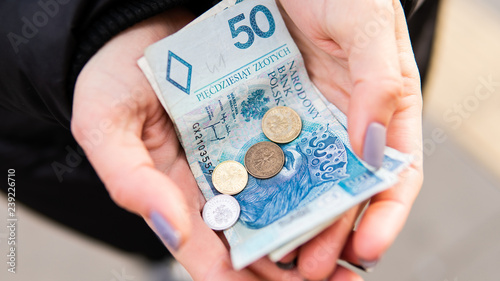 Polish Zloty In Female Hands Prices For Tourism In Poland Stock Polish Zloty In Female Hands Prices For Tourism In Poland Stock