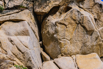 texture of the natural stone background outdoors, pattern