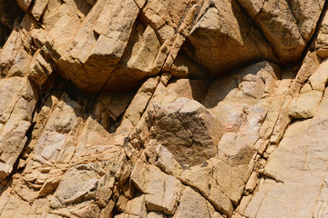 texture of the natural stone background outdoors, pattern
