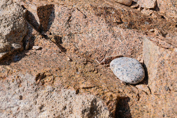 texture of the natural stone background outdoors, pattern