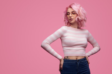 Beautiful woman with pink hairstyle