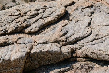 texture of the natural stone background outdoors, pattern