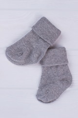 Grey wool winter socks for newborn baby.