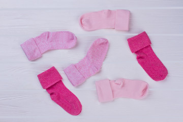 Gather of colourful pink socks.