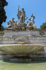 Fototapeta na wymiar Amazing view to Fountain of Neptune at Piazza del Popolo in city of Rome, Italy