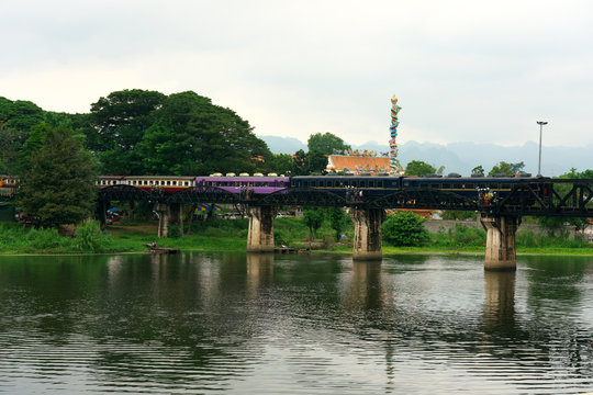 Kanchanaburi,Thailand-December 9, 2018: A Thai-Burma Railway train passes on River Kwai Bridege 