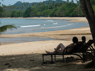 People enjoy vacation at Lio Beach in El Nido, Palawan