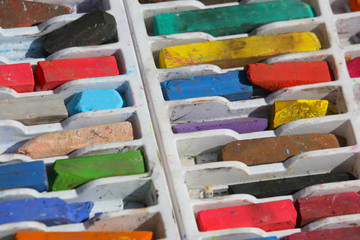 An artists random pieces of chalk ready to use on sidewalk street art in San Diego © Steve Azer